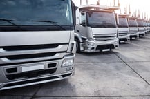 group-of-trucks-parked-in-row