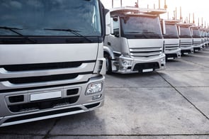 group-of-trucks-parked-in-row